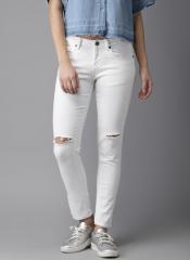 HERE&NOW Women White Skinny Fit Mid Rise Slash Knee Stretchable Jeans