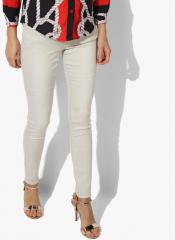 Deal Jeans Cream Solid Mid Rise Slim Fit Jeans women