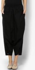 See Designs Black Solid Chinos women